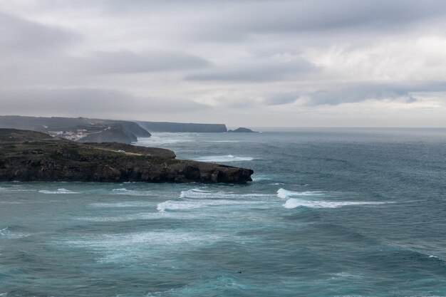 Beautiful rocky coastline and blue sea in Portugal