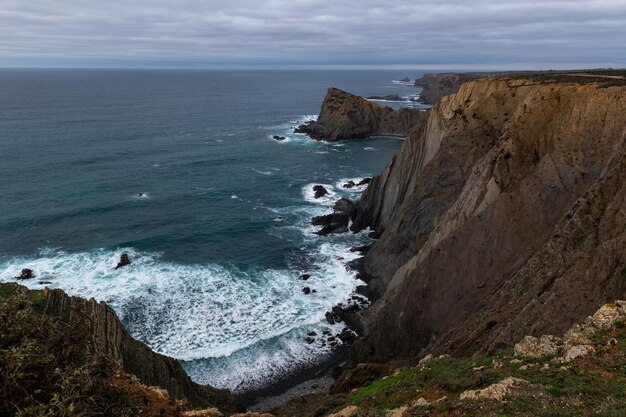 Beautiful rocky coastline and blue sea in Portugal