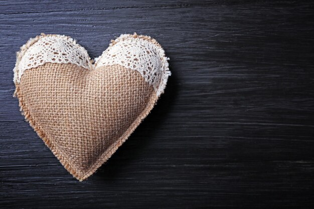 Beautiful romantic heart on wooden background