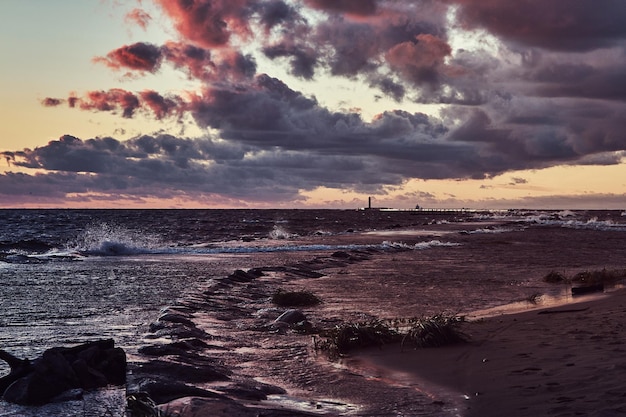 Beautiful and romantic sunset over the sea. Sunset on a beach.