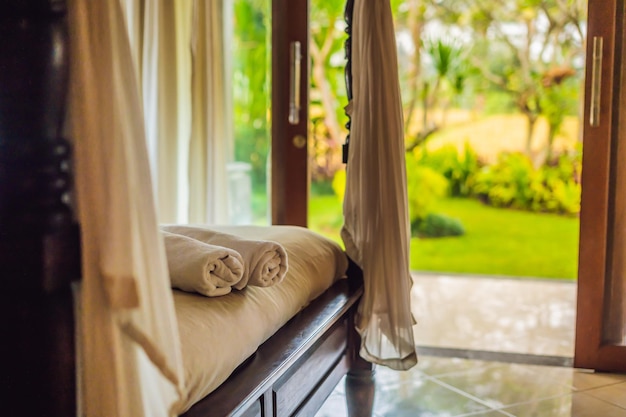 Beautiful room in villa towel on the bed