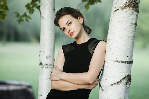 Beautiful russian girl in city park