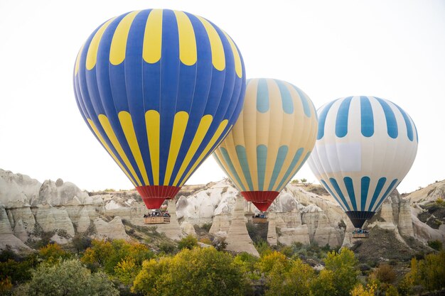 Beautiful scenery flight of balloons in the mountains of Cappadocia