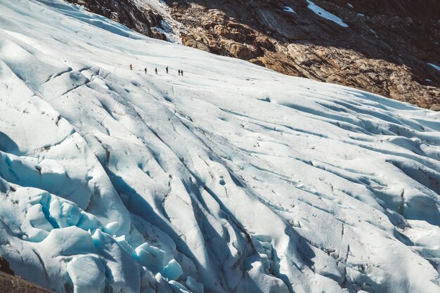 Beautiful scenery on the mountains and the glacier Svartisen landscape in Norway scandinavian nature landmarks ecology concept. Blue snow and ice