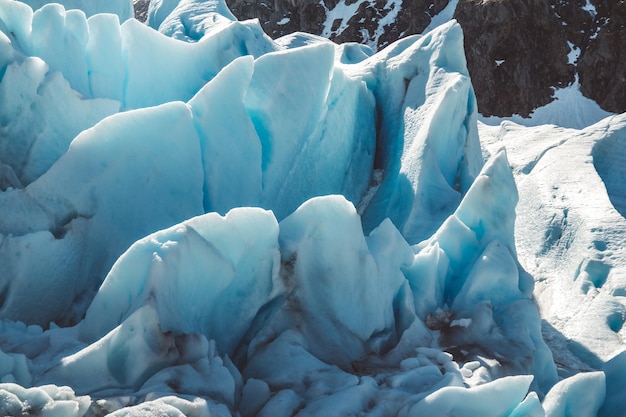 Beautiful scenery on the mountains and the glacier Svartisen landscape in Norway scandinavian nature landmarks ecology concept. Blue snow and ice