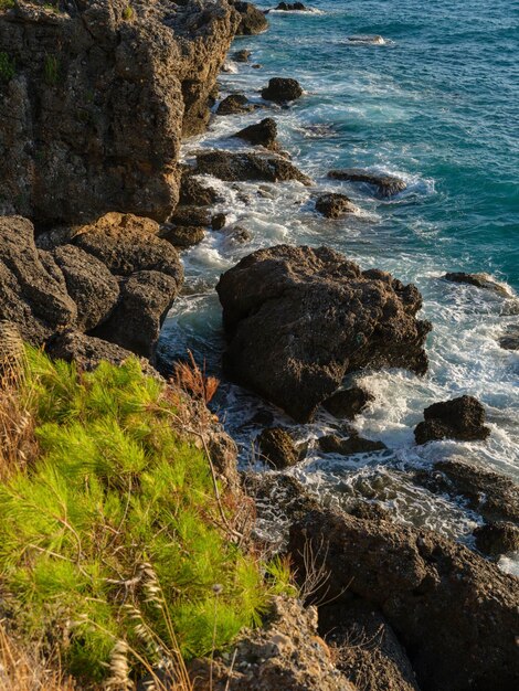 Beautiful sea waves crashing on the cliffs