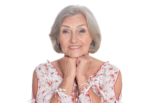 Beautiful senior woman posing isolated on white background