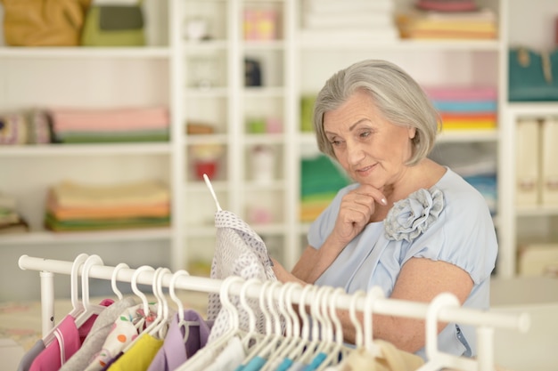 Beautiful senior woman in a shopping center