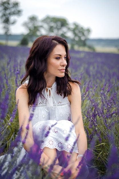Beautiful sensual young woman on the lavender field