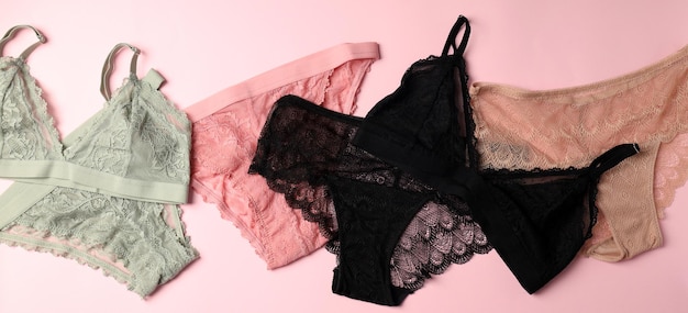 Beautiful set of women's underwear on pink background