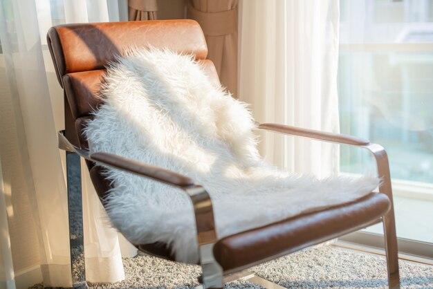 Photo beautiful shape armchair with white transparent curtain background evening light from sunlight