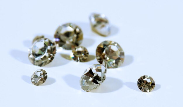 Beautiful shining crystals diamonds isolated on white