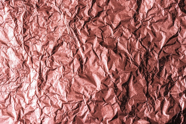 Beautiful shiny abstract crumpled golden foil background