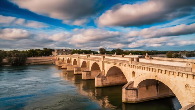 Photo beautiful shot of an avignon bridge in france with a blue sky