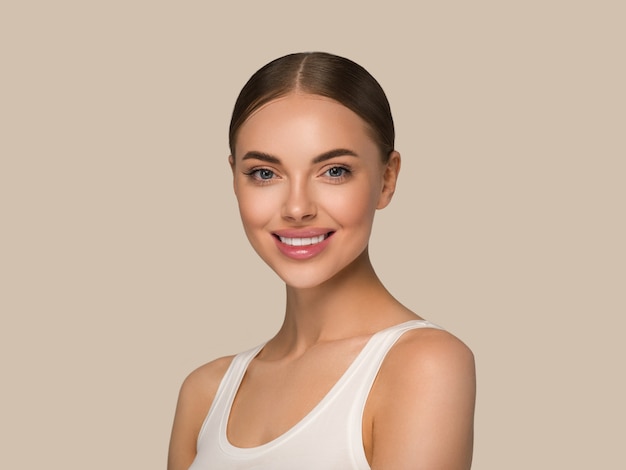 Beautiful skin face woman natural make up healthy skin beauty female model. Color background brown