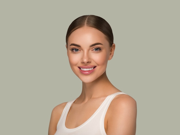 Beautiful skin face woman natural make up healthy skin beauty female model. Color background Green