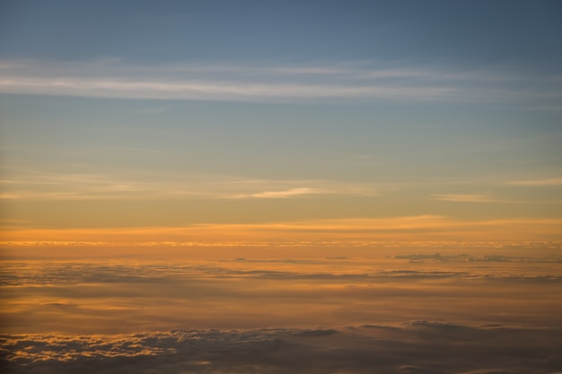 Beautiful sky and clouds before sunset shoot on the airplane