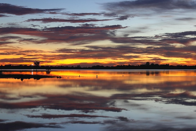 Beautiful sky in the morning with light reflection from the reservoir.