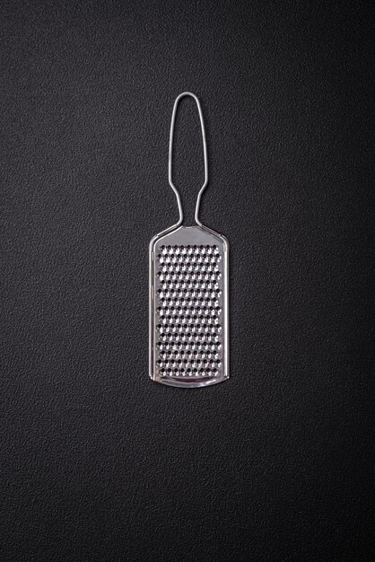 Beautiful small metal kitchen grater with handle