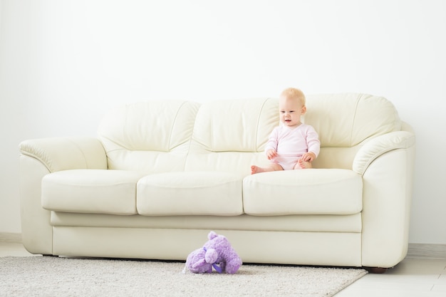 Beautiful smiling baby sitting