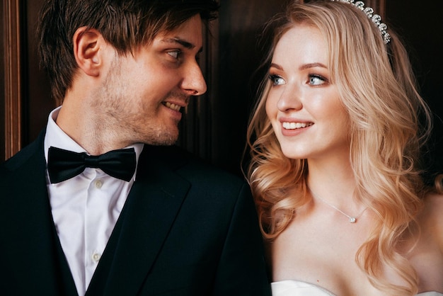 Beautiful and smiling bride and groom