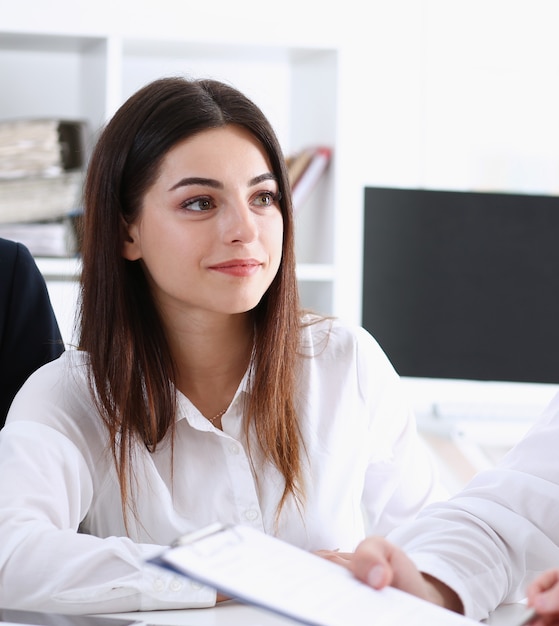 Beautiful smiling businesswoman portrait at workplace