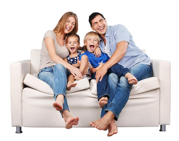 Photo beautiful smiling family sitting at sofa at home