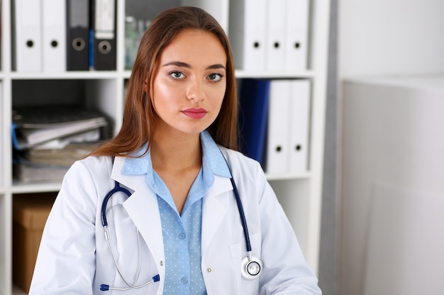 Beautiful smiling female doctor in office