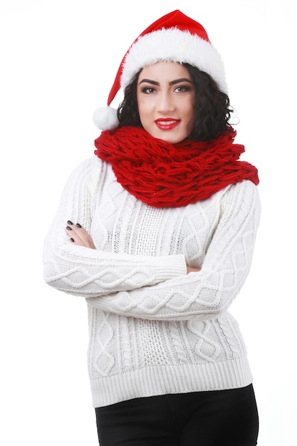 Beautiful smiling female model wear santa hat