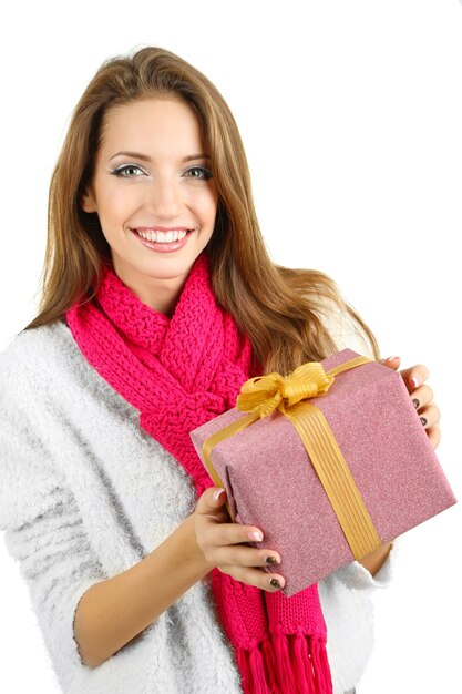 Beautiful smiling girl with gift isolated on white