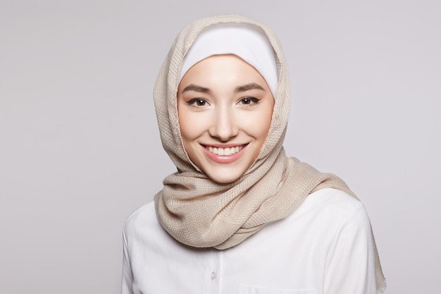 beautiful smiling islamic young woman with Makeup beauty Happy girl in hijab