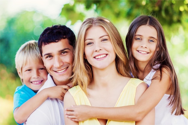 Beautiful smiling Lovely family in park