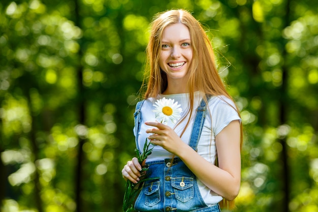 Beautiful smiling red-haired young woman