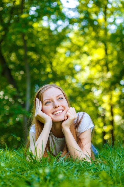 Beautiful smiling red-haired young woman