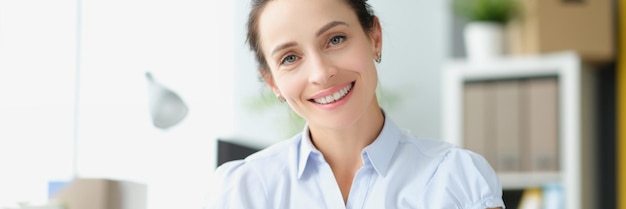 Beautiful smiling woman holding document letter in hands happy with loan approval notice