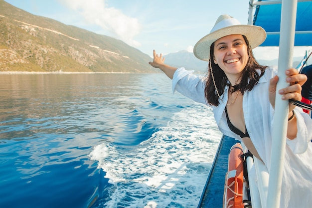 Beautiful smiling woman portrait at cruise ship summer sea vacation