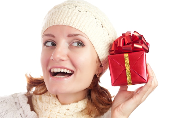 Beautiful smiling woman with gift