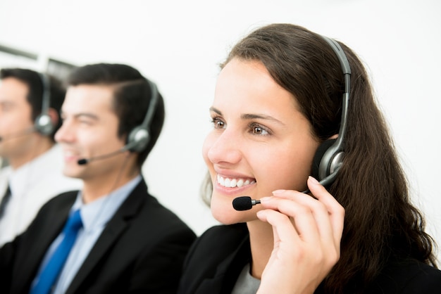 Beautiful smiling woman working in call center