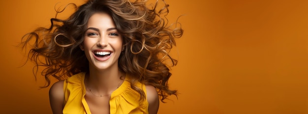 Beautiful smiling woman in yellow clothes on yellow background Lifestyle good mood copy space