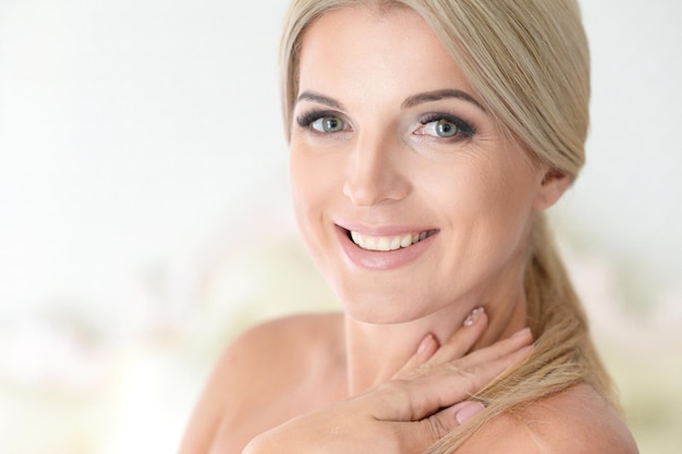 Beautiful smiling young woman closeup