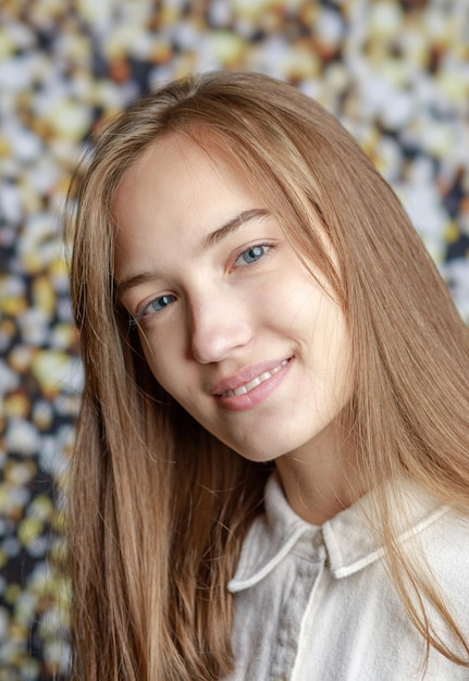 Beautiful smiling young woman with perfect skin face natural beauty concept isolated on studio background