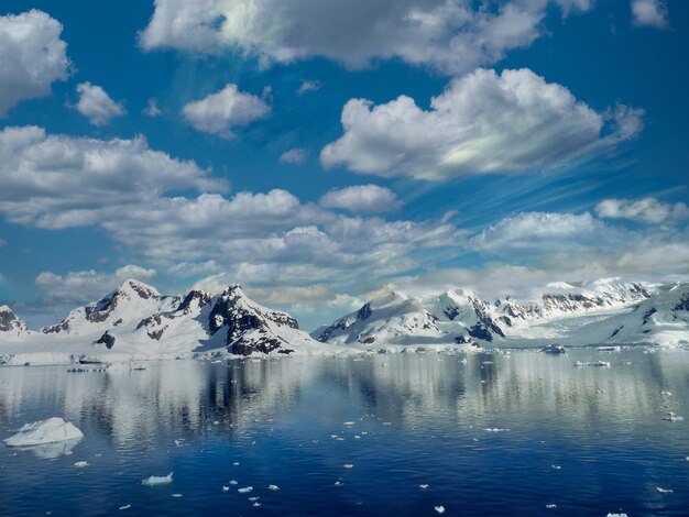 Beautiful snow scene in the mountains at sunrise in winter forested snow mountain landscape