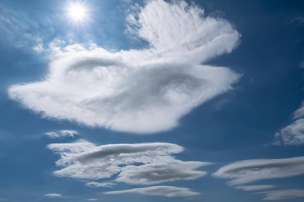 Beautiful soft clouds against the blue sky on a sunny day