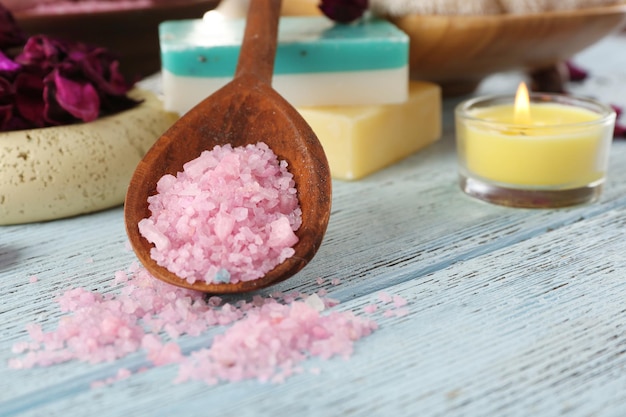 Beautiful spa composition with sea salt on table close up