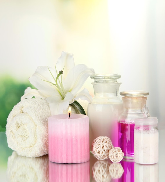 Beautiful spa setting with lily on natural background