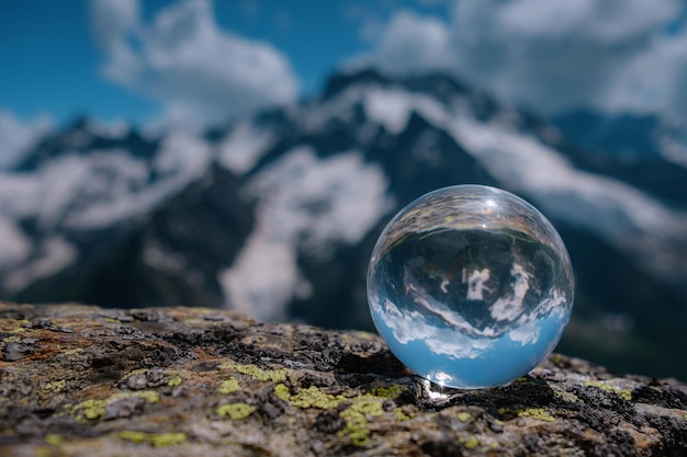 Beautiful spherical glass ball with majestic Caucasian mountains