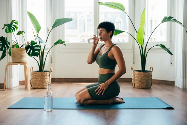 Beautiful sporty girl making yoga training