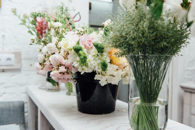 Beautiful spring flowers in glass vases