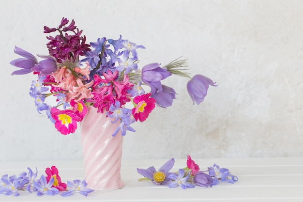 Beautiful spring flowers in pink vase