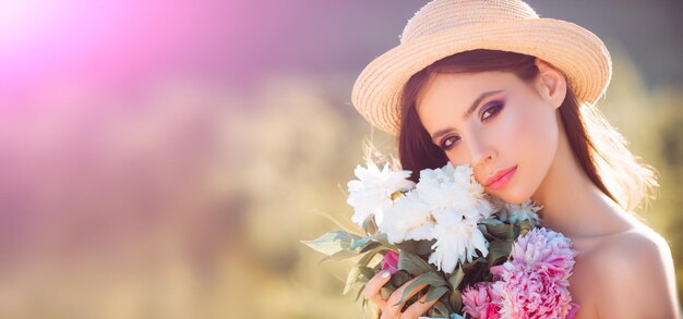 Beautiful spring woman in blooming tree portrait of young beautiful woman in spring blossom trees be